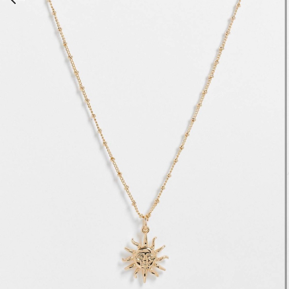 ASOS DESIGN necklace with sun pendant in gold tone